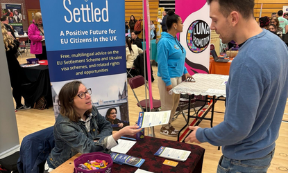 Settled providing outreach at a jobs fair in Cardiff