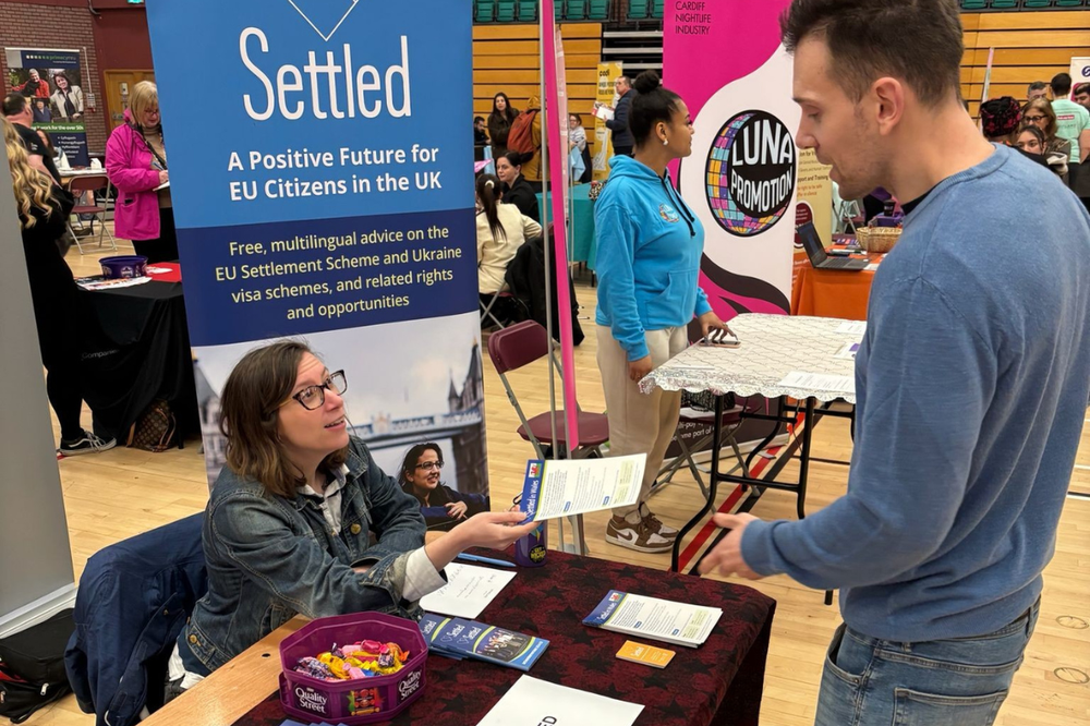 Settled providing outreach at a jobs fair in Cardiff