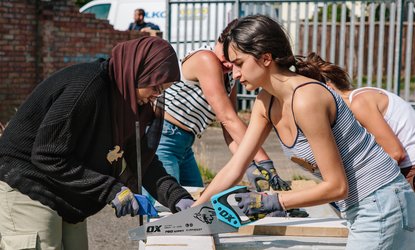 People working together on a building project as part of WeCanMake's Festival of Making Together in 2025