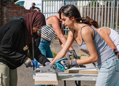 People working together on a building project as part of WeCanMake's Festival of Making Together in 2025