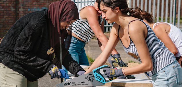 People working together on a building project as part of WeCanMake's Festival of Making Together in 2025