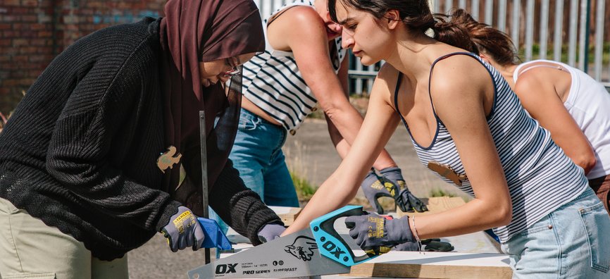 People working together on a building project as part of WeCanMake's Festival of Making Together in 2025